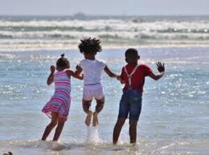 Kids jumping in water.