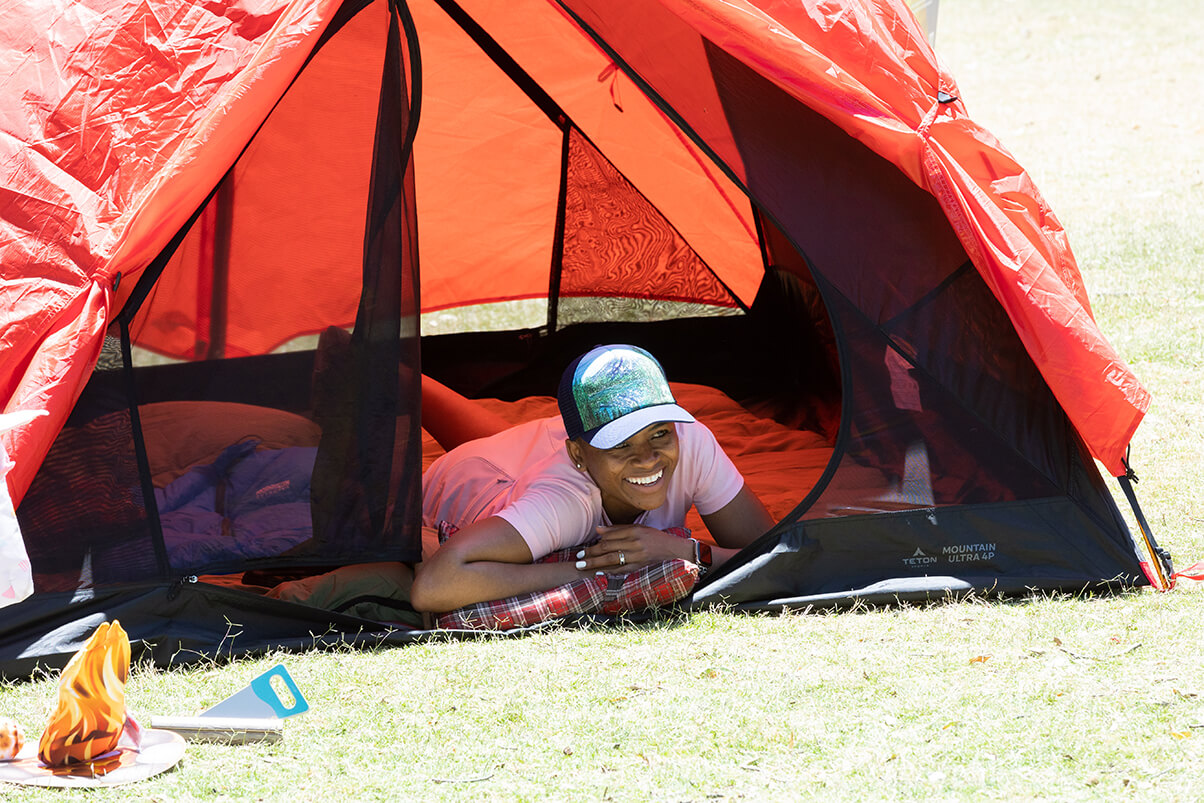 girl smiling in tent