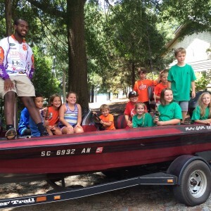 Hunter with kids in the Let’s Get Outdoors program.
