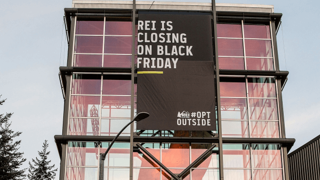 #OPTOUTSIDE Banner on building