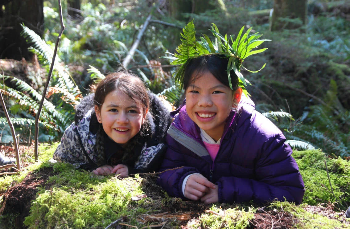 two kids in the forest