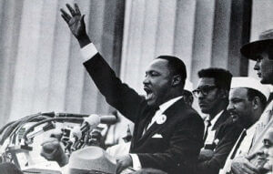 MLK Speaking to a crowd.