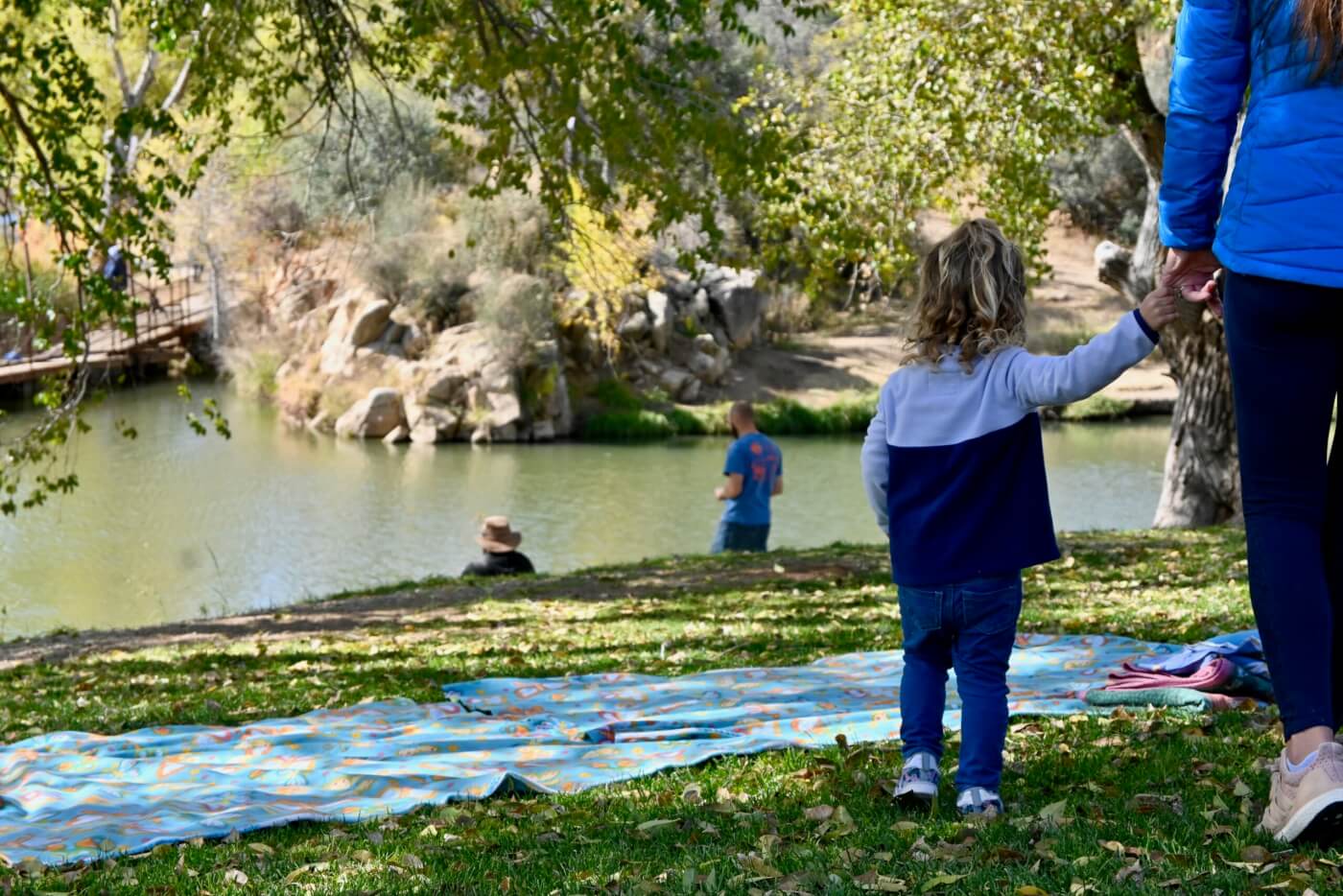 view of mother and daughter, overlooking a lake in Prescott Arizona